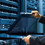 46086334 – man fix server network in data center room .