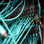 Cables and computers are seen inside a data centre at an office in the heart of the financial district in London